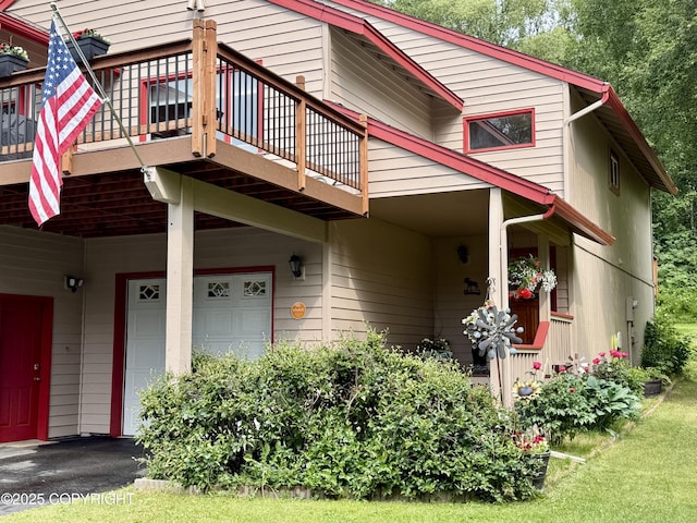 11741 Mary Ave, Anchorage, AK 99515 - view of front of home featuring a deck and a garage