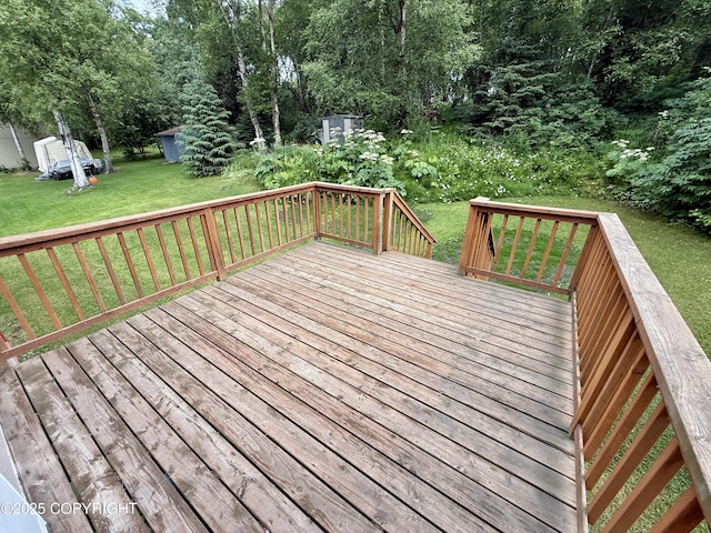 11741 Mary Ave, Anchorage, AK 99515 - wooden deck with a lawn and a shed