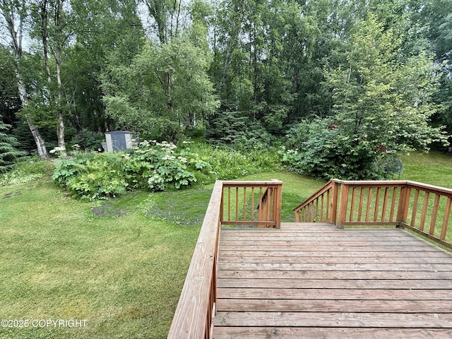 11741 Mary Ave, Anchorage, AK 99515 - wooden terrace featuring a lawn