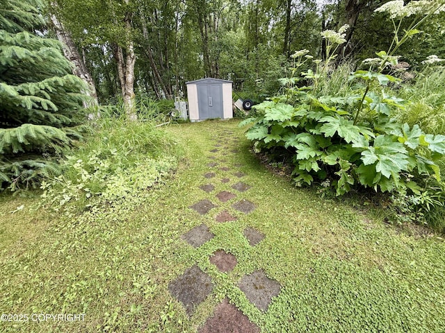 11741 Mary Ave, Anchorage, AK 99515 - view of yard featuring a storage shed