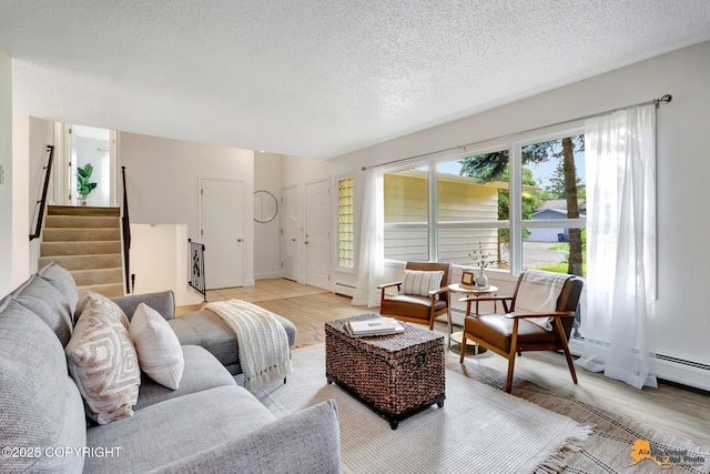 3116 Briarcliff Dr, Anchorage, AK 99508 - living room featuring stairs and a textured ceiling