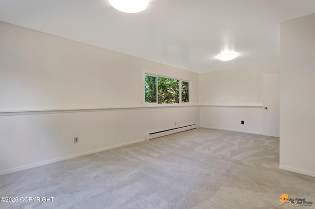 3116 Briarcliff Dr, Anchorage, AK 99508 - empty room featuring baseboard heating and light colored carpet