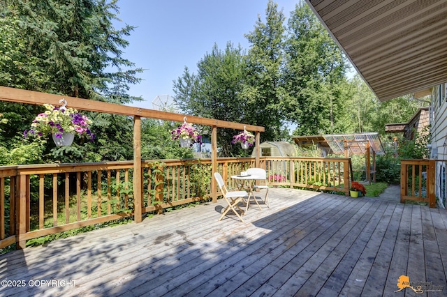 3116 Briarcliff Dr, Anchorage, AK 99508 - wooden deck with an outbuilding