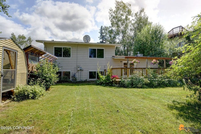 3116 Briarcliff Dr, Anchorage, AK 99508 - back of property featuring a lawn and a wooden deck