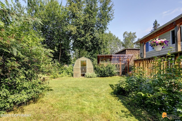 3116 Briarcliff Dr, Anchorage, AK 99508 - view of grassy yard with an outdoor structure