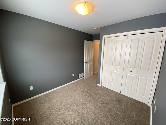 114 Rusty Allen Pl # 31, Anchorage, AK 99504 - unfurnished bedroom with carpet and a closet