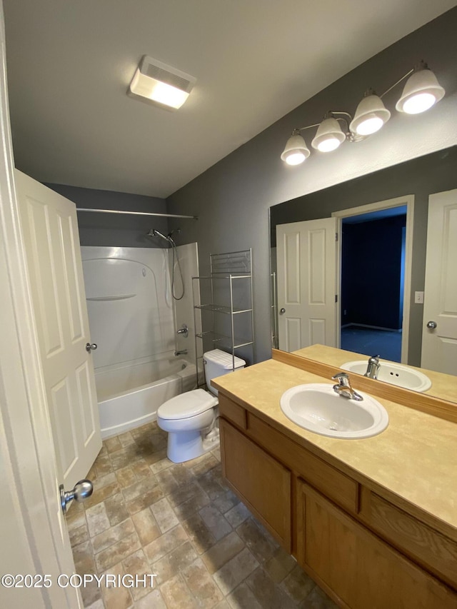 114 Rusty Allen Pl # 31, Anchorage, AK 99504 - full bathroom with vanity, shower / bath combination, and stone finish flooring