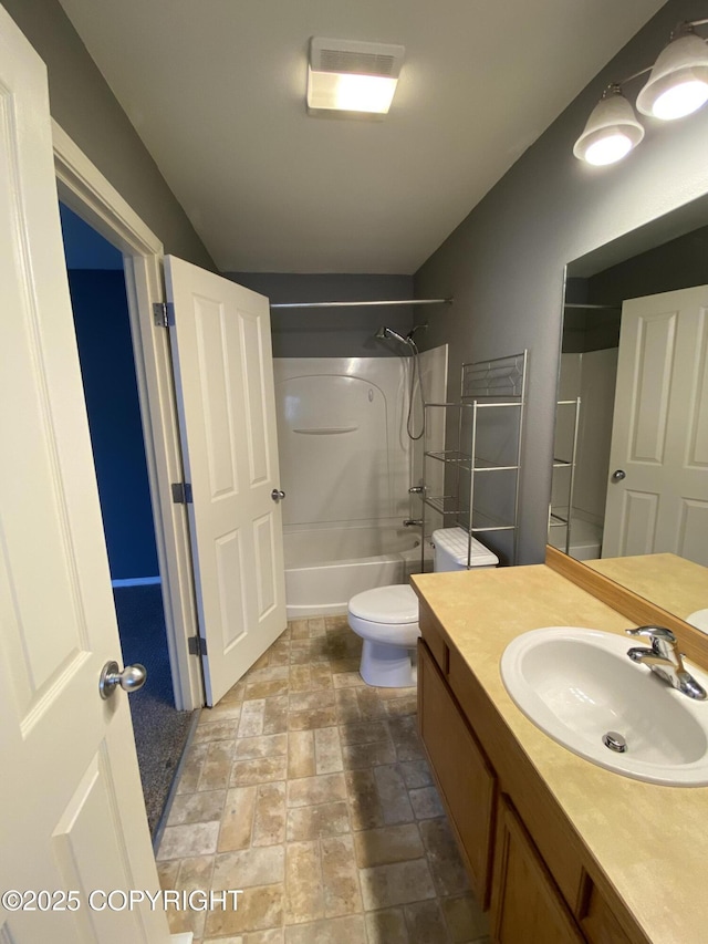114 Rusty Allen Pl # 31, Anchorage, AK 99504 - full bath featuring vanity, bathtub / shower combination, and stone finish floors