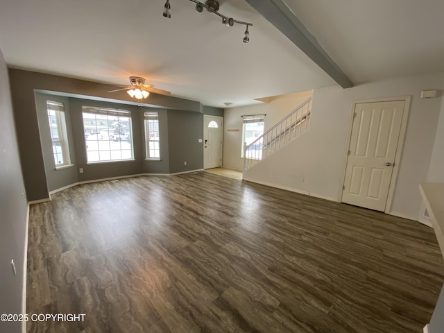 114 Rusty Allen Pl # 31, Anchorage, AK 99504 - unfurnished living room featuring a ceiling fan, stairway, and beamed ceiling