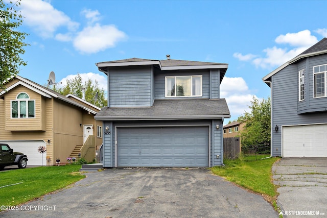 9755 Newhaven Loop, Anchorage, AK 99507 - traditional home with an attached garage, stairway, and roof with shingles