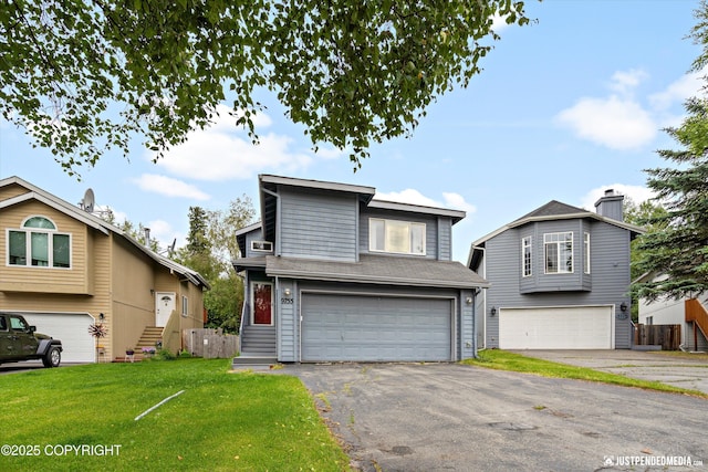 9755 Newhaven Loop, Anchorage, AK 99507 - view of front facade featuring an attached garage, a front lawn, asphalt driveway, and a chimney