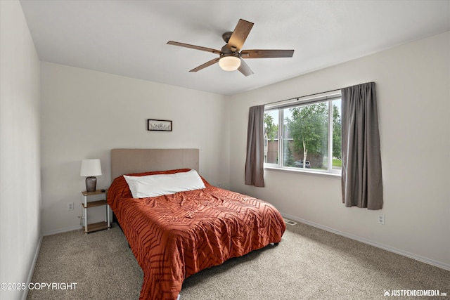 9755 Newhaven Loop, Anchorage, AK 99507 - bedroom with carpet floors and a ceiling fan