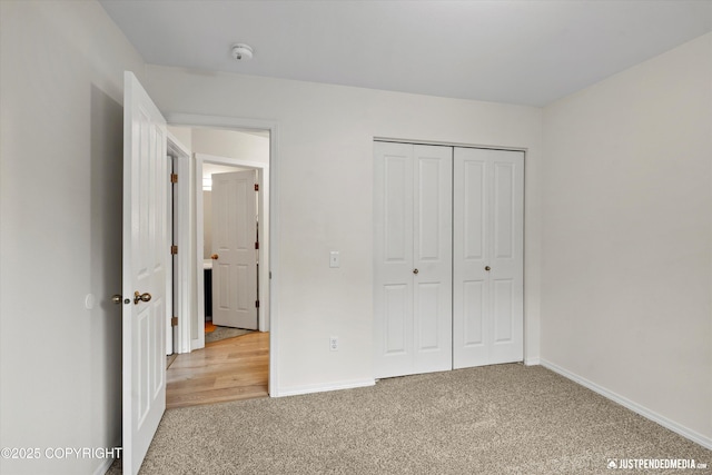 9755 Newhaven Loop, Anchorage, AK 99507 - unfurnished bedroom with carpet and a closet