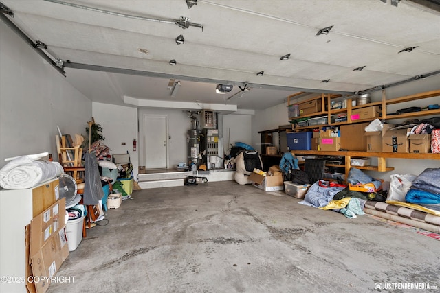 9755 Newhaven Loop, Anchorage, AK 99507 - garage with a garage door opener and secured water heater