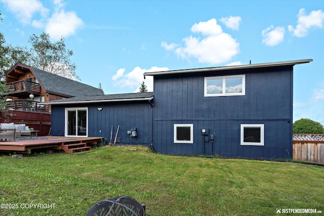 8410 E 20th Ave, Anchorage, AK 99504 - back of property with a wooden deck