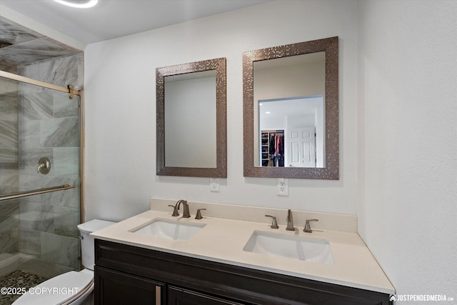 8410 E 20th Ave, Anchorage, AK 99504 - full bath featuring double vanity, a shower stall, and a walk in closet
