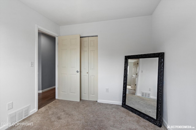 8410 E 20th Ave, Anchorage, AK 99504 - unfurnished bedroom with carpet flooring and a closet