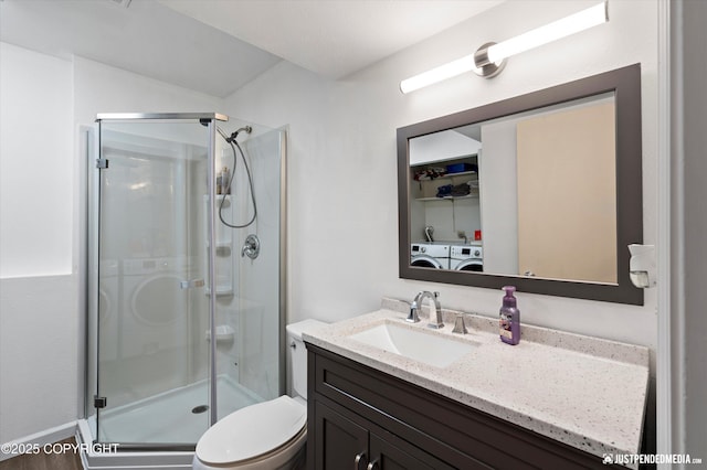 8410 E 20th Ave, Anchorage, AK 99504 - full bath with a stall shower, separate washer and dryer, and vanity