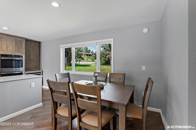 8410 E 20th Ave, Anchorage, AK 99504 - dining room featuring light wood-style floors and recessed lighting
