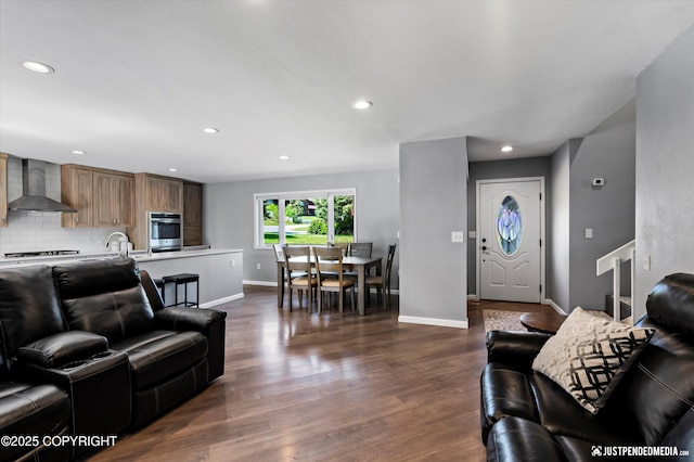 8410 E 20th Ave, Anchorage, AK 99504 - living room with dark wood finished floors and recessed lighting