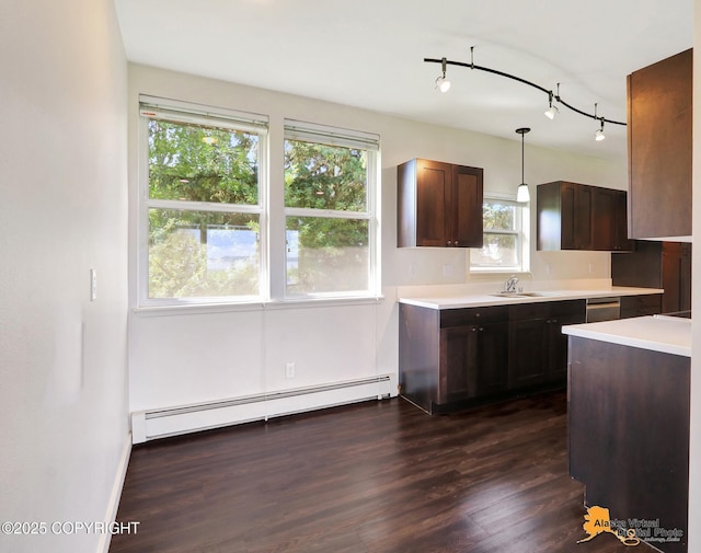 1414 W 7th Ave # 3, Anchorage, AK 99501 - kitchen with a baseboard heating unit, light countertops, pendant lighting, and dark wood finished floors