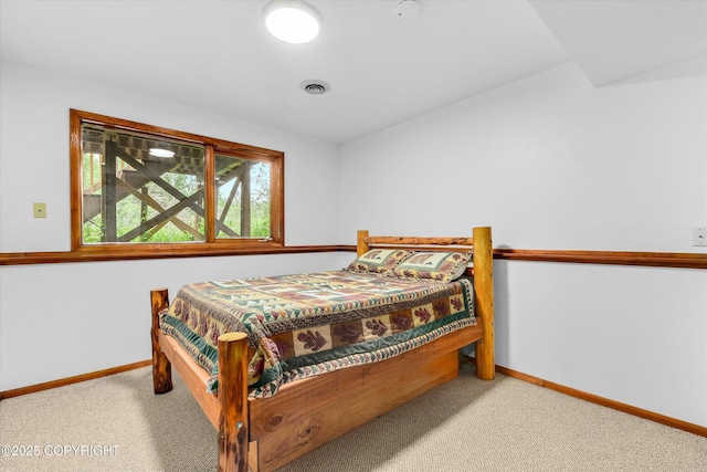12145 Rainbow Ave, Anchorage, AK 99516 - bedroom featuring baseboards and carpet