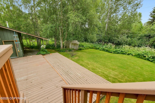 12145 Rainbow Ave, Anchorage, AK 99516 - wooden deck featuring a yard and an outdoor structure