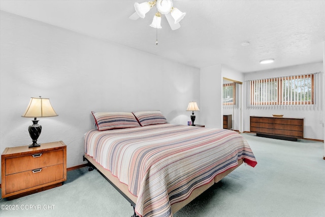 12145 Rainbow Ave, Anchorage, AK 99516 - bedroom featuring light colored carpet, a closet, and ceiling fan