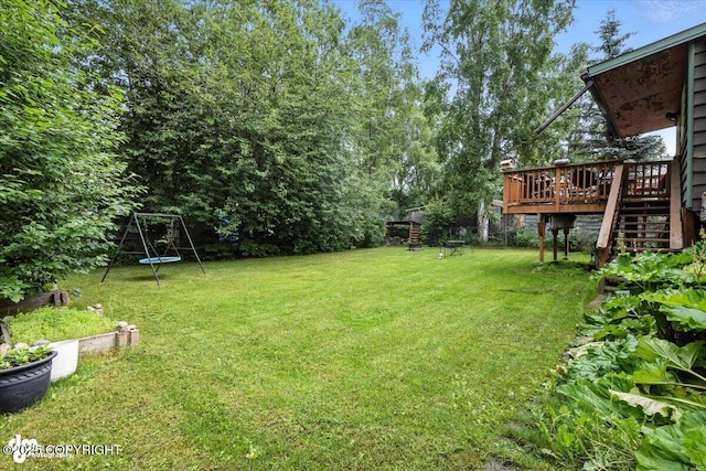 4733 Becharof St, Anchorage, AK 99507 - view of green lawn featuring a wooden deck and stairway