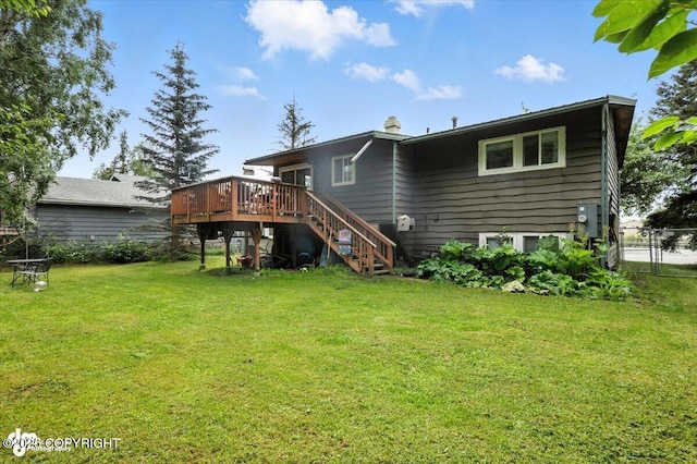 4733 Becharof St, Anchorage, AK 99507 - rear view of property featuring a wooden deck, stairs, and a chimney
