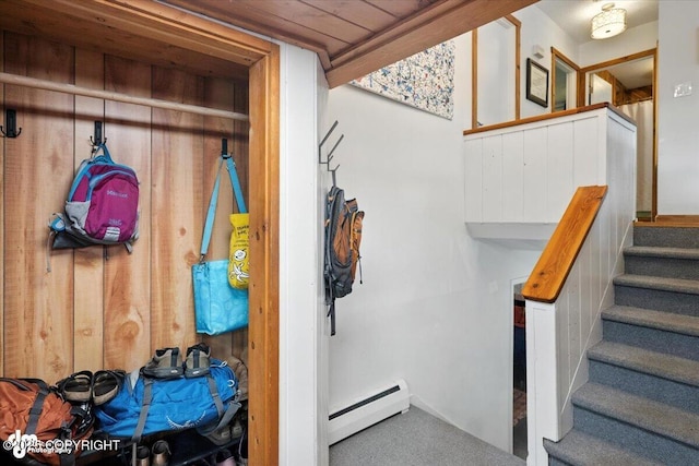 4733 Becharof St, Anchorage, AK 99507 - stairs with baseboard heating and carpet