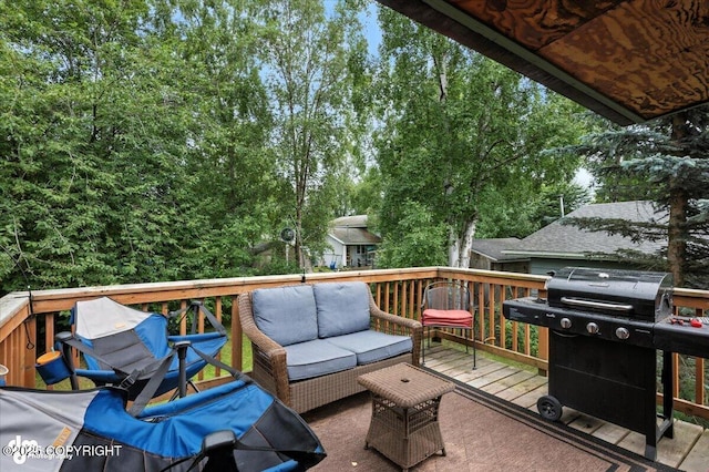 4733 Becharof St, Anchorage, AK 99507 - wooden terrace with grilling area, outdoor lounge area, and view of wooded area