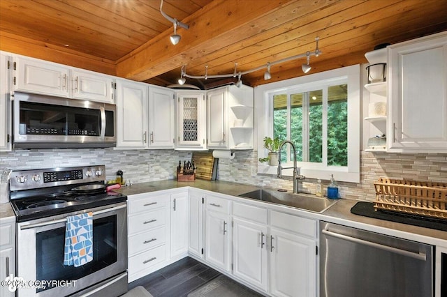 4733 Becharof St, Anchorage, AK 99507 - kitchen featuring stainless steel appliances, open shelves, white cabinets, and a wood ceiling with exposed beams