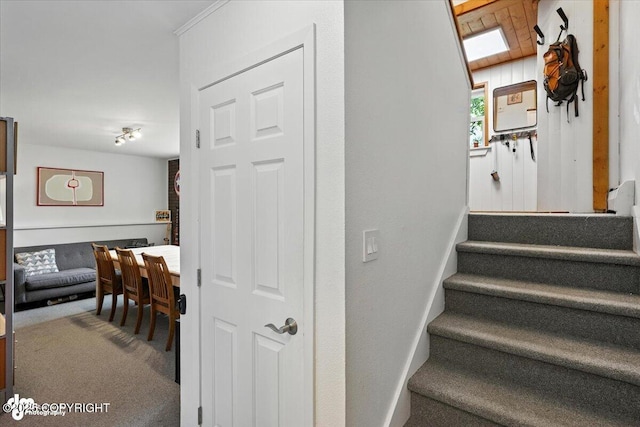 4733 Becharof St, Anchorage, AK 99507 - stairway featuring carpet floors