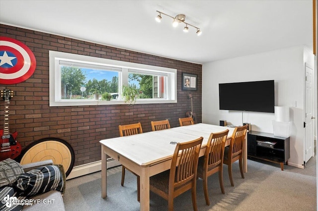 4733 Becharof St, Anchorage, AK 99507 - carpeted dining area featuring brick wall and baseboard heating