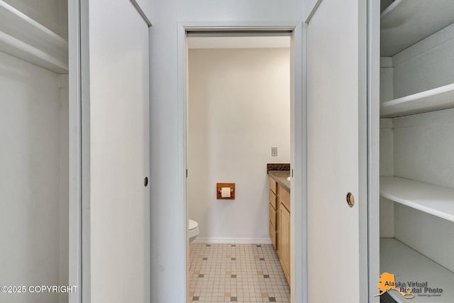 4650 Reka Dr # F6, Anchorage, AK 99508 - bathroom with vanity and toilet