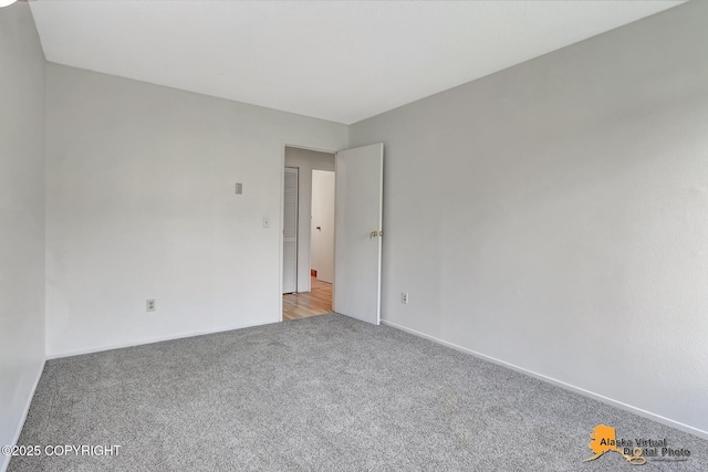 4650 Reka Dr # F6, Anchorage, AK 99508 - spare room with light colored carpet and baseboards