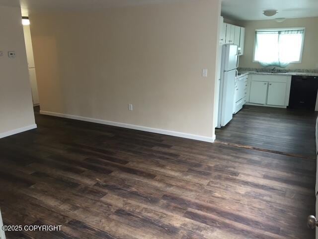 420 E 14th Ave, Anchorage, AK 99501 - kitchen with freestanding refrigerator, dishwasher, dark wood finished floors, and light countertops