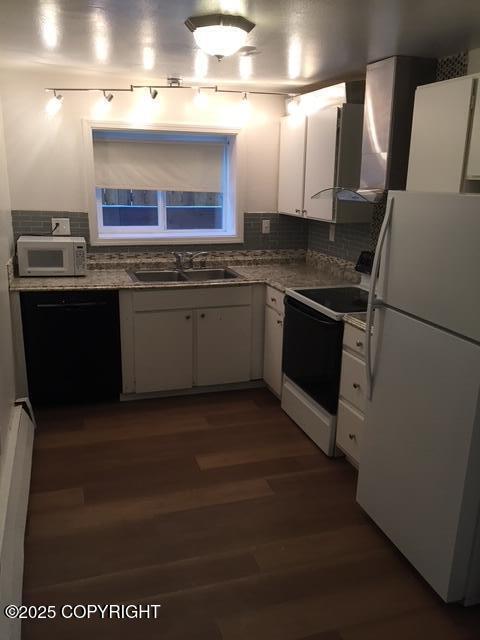 420 E 14th Ave, Anchorage, AK 99501 - kitchen featuring white appliances, white cabinetry, dark wood-type flooring, and decorative backsplash