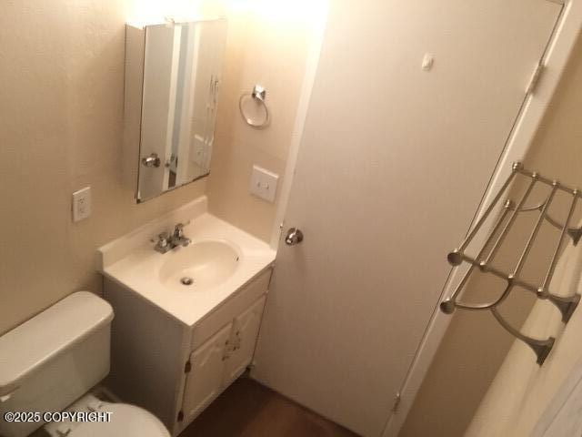 420 E 14th Ave, Anchorage, AK 99501 - bathroom featuring vanity and toilet