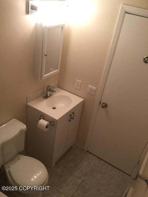 420 E 14th Ave, Anchorage, AK 99501 - bathroom featuring vanity and tile patterned floors
