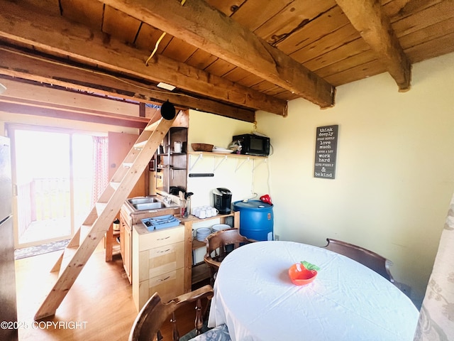 32425 Sterling Hwy, Anchor Point, AK 99556 - dining area featuring a wooden ceiling with exposed beams