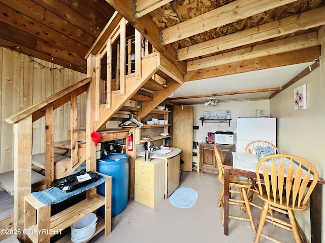 32425 Sterling Hwy, Anchor Point, AK 99556 - dining room featuring stairs and concrete floors