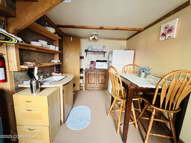 32425 Sterling Hwy, Anchor Point, AK 99556 - dining room with concrete flooring