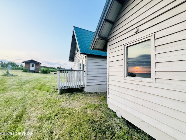 32425 Sterling Hwy, Anchor Point, AK 99556 - view of home's exterior featuring a lawn