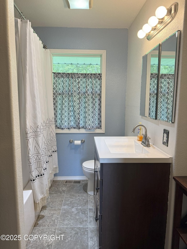 54110 Field Dr, Nikiski/North Kenai, AK 99611 - bathroom with vanity, plenty of natural light, and shower / bathtub combination with curtain