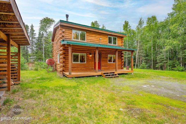 1291 N Rainbow Park Dr, Wasilla, AK 99623 - rear view of house featuring log exterior, a yard, and a deck