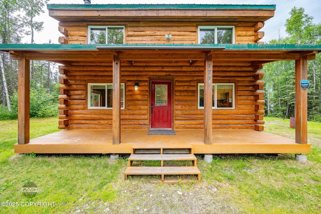 1291 N Rainbow Park Dr, Wasilla, AK 99623 - back of house with log siding