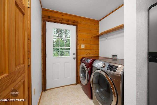 1291 N Rainbow Park Dr, Wasilla, AK 99623 - washroom with separate washer and dryer and wood walls