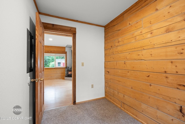 1291 N Rainbow Park Dr, Wasilla, AK 99623 - carpeted spare room with wooden walls